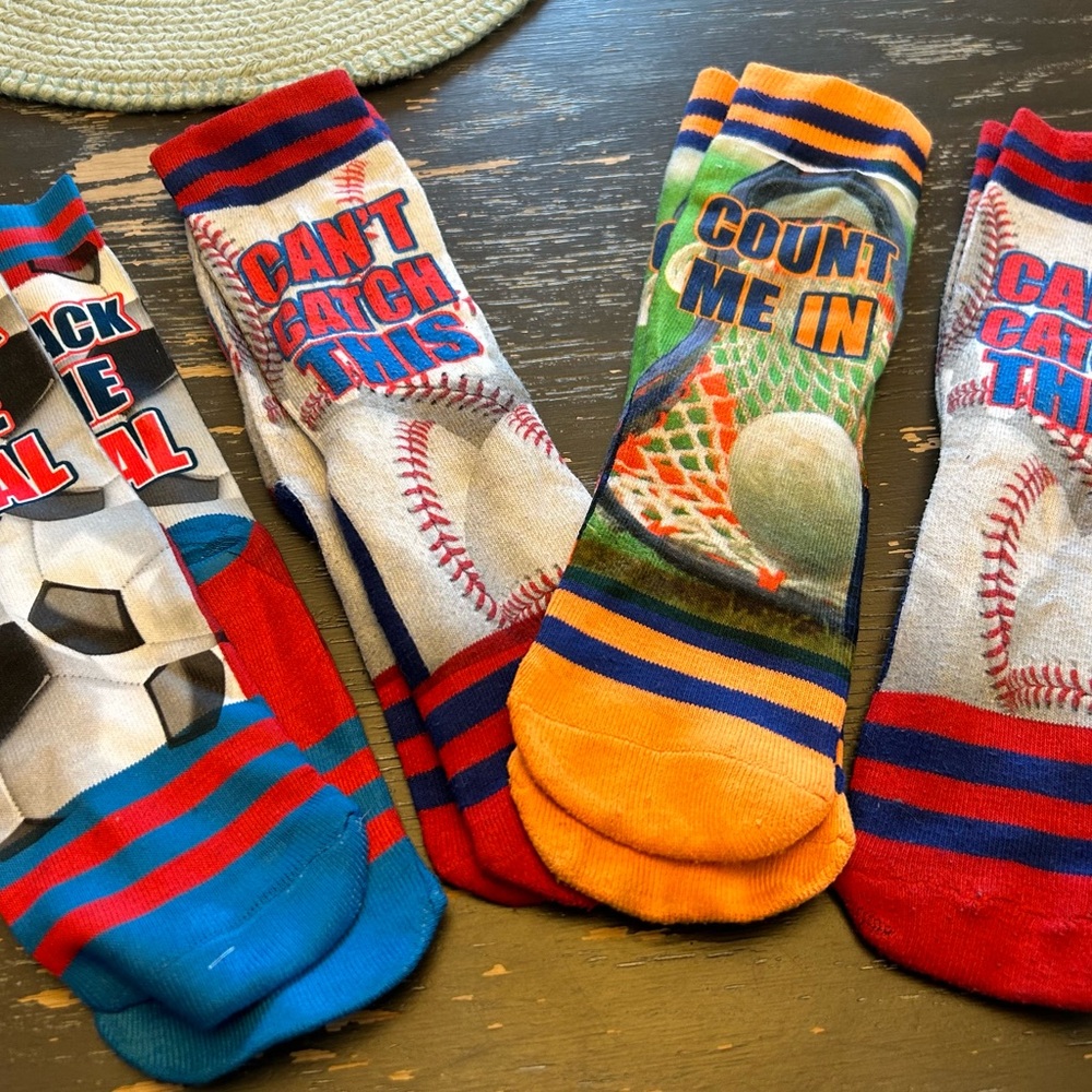 8 pair of kids baseball, soccer socks. Grade/Middle school aged.